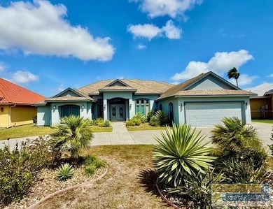 Stunning 3-bedroom 3.5-bathroom lakefront home offers the on South Padre Island Golf Club in Texas - for sale on GolfHomes.com, golf home, golf lot