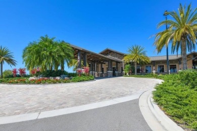 Welcome to 15520 Castle Park Terrace, a custom Neal Signature on Ritz-Carlton Members Golf Club in Florida - for sale on GolfHomes.com, golf home, golf lot