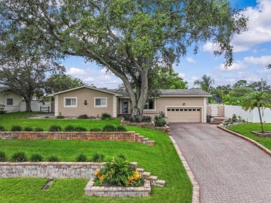 Welcome to this beautifully maintained home in the sought-after on The Dunedin Country Club in Florida - for sale on GolfHomes.com, golf home, golf lot