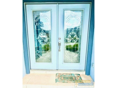 Stunning 3-bedroom 3.5-bathroom lakefront home offers the on South Padre Island Golf Club in Texas - for sale on GolfHomes.com, golf home, golf lot