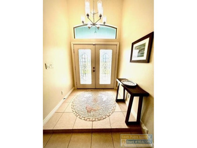 Stunning 3-bedroom 3.5-bathroom lakefront home offers the on South Padre Island Golf Club in Texas - for sale on GolfHomes.com, golf home, golf lot