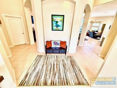 Stunning 3-bedroom 3.5-bathroom lakefront home offers the on South Padre Island Golf Club in Texas - for sale on GolfHomes.com, golf home, golf lot