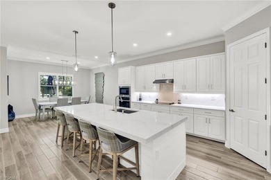 Priced to sell and positioned as one of the most upgraded homes on Bonita National Golf Course in Florida - for sale on GolfHomes.com, golf home, golf lot