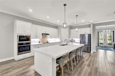 Priced to sell and positioned as one of the most upgraded homes on Bonita National Golf Course in Florida - for sale on GolfHomes.com, golf home, golf lot