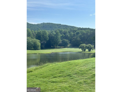 Extraordinary Lot offers beautiful views of Mountains, Lake and on The Orchard Golf and Country Club in Georgia - for sale on GolfHomes.com, golf home, golf lot