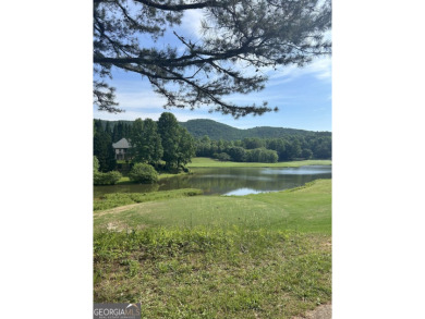 Extraordinary Lot offers beautiful views of Mountains, Lake and on The Orchard Golf and Country Club in Georgia - for sale on GolfHomes.com, golf home, golf lot