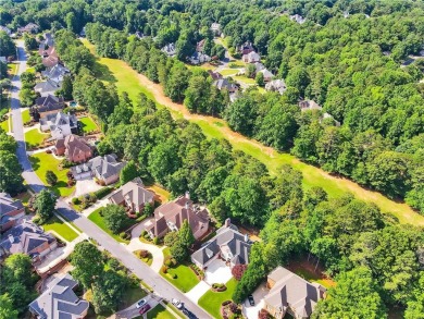 A rare gem has arrived on the market. This is one of those rare on Towne Lake Hills Golf Club in Georgia - for sale on GolfHomes.com, golf home, golf lot