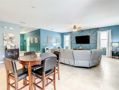 This fully furnished and Disney-themed property is located in on The Oasis Club at Champions Gate in Florida - for sale on GolfHomes.com, golf home, golf lot