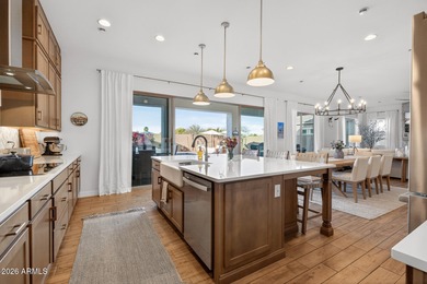 Pool home with a spa & panoramic views of the White Tank on Verrado Golf Club  in Arizona - for sale on GolfHomes.com, golf home, golf lot