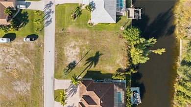 BUILD a custom waterfront pool Home on this oversized Gulf on Royal Tee Country Club in Florida - for sale on GolfHomes.com, golf home, golf lot
