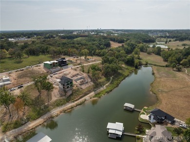 Come build your dream home or use the sellers current plans in on The Oaks Golf Course in Missouri - for sale on GolfHomes.com, golf home, golf lot