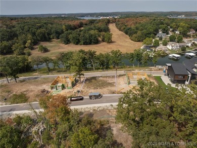 Come build your dream home or use the sellers current plans in on The Oaks Golf Course in Missouri - for sale on GolfHomes.com, golf home, golf lot