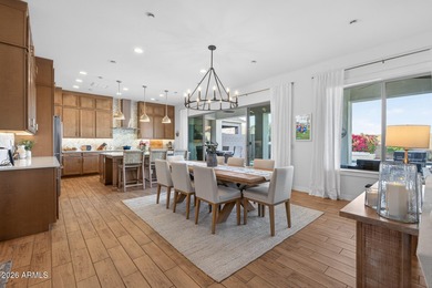 Pool home with a spa & panoramic views of the White Tank on Verrado Golf Club  in Arizona - for sale on GolfHomes.com, golf home, golf lot