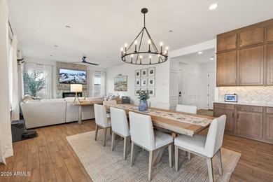 Pool home with a spa & panoramic views of the White Tank on Verrado Golf Club  in Arizona - for sale on GolfHomes.com, golf home, golf lot