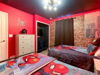 This fully furnished and Disney-themed property is located in on The Oasis Club at Champions Gate in Florida - for sale on GolfHomes.com, golf home, golf lot