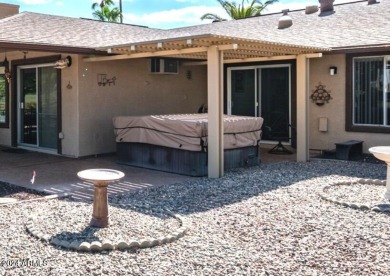 Beautiful, well-maintained home is situated on a serene golf on PalmBrook Country Club in Arizona - for sale on GolfHomes.com, golf home, golf lot