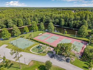 Welcome to your dream villa in the gated community of Tealwood on Lansbrook Golf Club in Florida - for sale on GolfHomes.com, golf home, golf lot