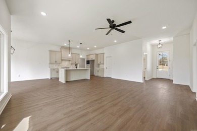 This 3 bedroom/ 2 bathroom new construction home in Diamondhead on Diamondhead Golf and Country Club in Arkansas - for sale on GolfHomes.com, golf home, golf lot