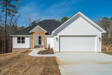 This 3 bedroom/ 2 bathroom new construction home in Diamondhead on Diamondhead Golf and Country Club in Arkansas - for sale on GolfHomes.com, golf home, golf lot