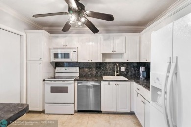 Don't miss buying this easy access ground floor unit in Palm on Palm-Aire Country Club and Resort - Palms in Florida - for sale on GolfHomes.com, golf home, golf lot