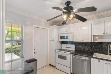 Don't miss buying this easy access ground floor unit in Palm on Palm-Aire Country Club and Resort - Palms in Florida - for sale on GolfHomes.com, golf home, golf lot