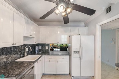 Don't miss buying this easy access ground floor unit in Palm on Palm-Aire Country Club and Resort - Palms in Florida - for sale on GolfHomes.com, golf home, golf lot