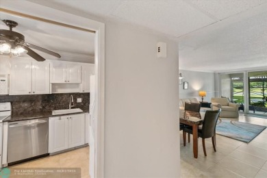 Don't miss buying this easy access ground floor unit in Palm on Palm-Aire Country Club and Resort - Palms in Florida - for sale on GolfHomes.com, golf home, golf lot