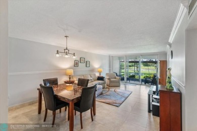 Don't miss buying this easy access ground floor unit in Palm on Palm-Aire Country Club and Resort - Palms in Florida - for sale on GolfHomes.com, golf home, golf lot