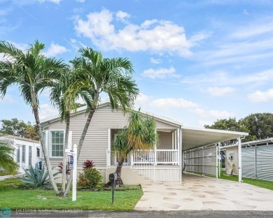 Discover your dream home in this beautifully renovated 3 bedroom on Davie Golf Club in Florida - for sale on GolfHomes.com, golf home, golf lot