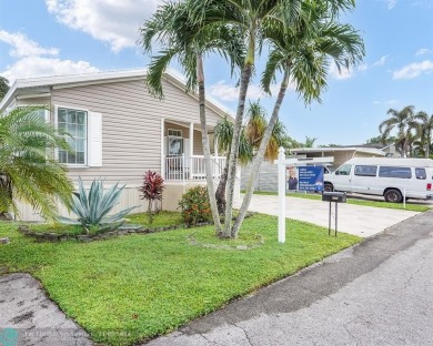 Discover your dream home in this beautifully renovated 3 bedroom on Davie Golf Club in Florida - for sale on GolfHomes.com, golf home, golf lot