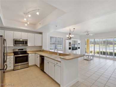 Nestled up to stunning waterfront and golf course views in the on Miromar Lakes Golf Club in Florida - for sale on GolfHomes.com, golf home, golf lot