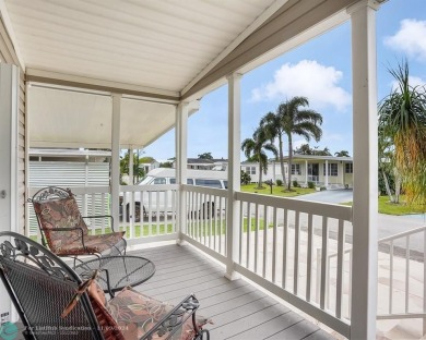 Discover your dream home in this beautifully renovated 3 bedroom on Davie Golf Club in Florida - for sale on GolfHomes.com, golf home, golf lot