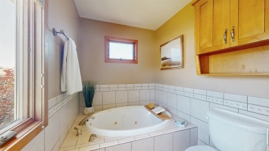 Discover the space and comfort of this phenomenal walk-out ranch on River Valley Golf Course in Iowa - for sale on GolfHomes.com, golf home, golf lot
