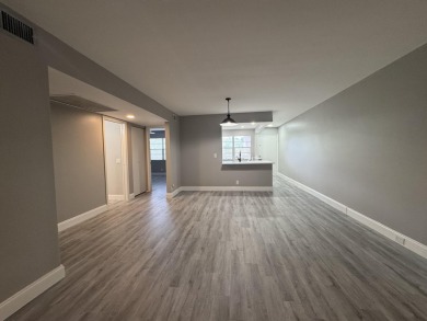 FOR SALE- Step into style and comfort with this beautifully on Wynmoor Golf Course in Florida - for sale on GolfHomes.com, golf home, golf lot