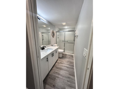 FOR SALE- Step into style and comfort with this beautifully on Wynmoor Golf Course in Florida - for sale on GolfHomes.com, golf home, golf lot