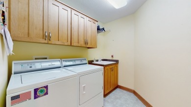 Discover the space and comfort of this phenomenal walk-out ranch on River Valley Golf Course in Iowa - for sale on GolfHomes.com, golf home, golf lot