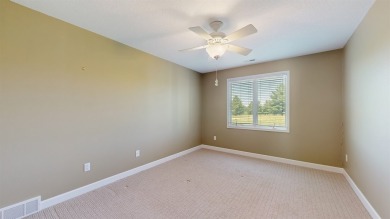 Discover the space and comfort of this phenomenal walk-out ranch on River Valley Golf Course in Iowa - for sale on GolfHomes.com, golf home, golf lot