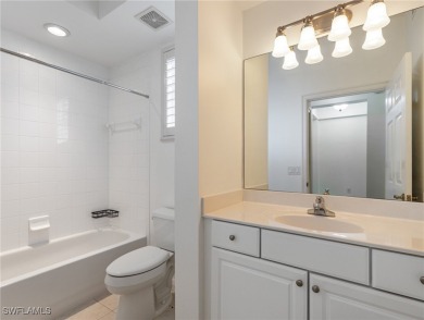 Nestled up to stunning waterfront and golf course views in the on Miromar Lakes Golf Club in Florida - for sale on GolfHomes.com, golf home, golf lot