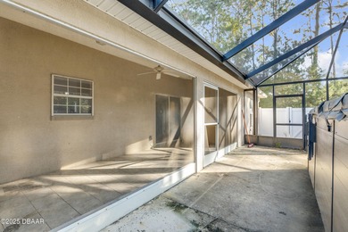 This 3-bedroom, 2-bath home in Palm Coast, is full of potential on The Grand Club Cypress Course in Florida - for sale on GolfHomes.com, golf home, golf lot