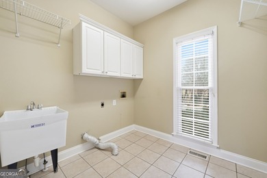 This 3 sided brick home on a full basement with a large owner's on The Golf Club At Bradshaw Farm in Georgia - for sale on GolfHomes.com, golf home, golf lot