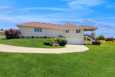 Discover the space and comfort of this phenomenal walk-out ranch on River Valley Golf Course in Iowa - for sale on GolfHomes.com, golf home, golf lot
