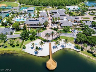 Nestled up to stunning waterfront and golf course views in the on Miromar Lakes Golf Club in Florida - for sale on GolfHomes.com, golf home, golf lot