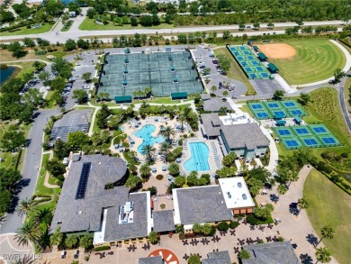 Nestled up to stunning waterfront and golf course views in the on Miromar Lakes Golf Club in Florida - for sale on GolfHomes.com, golf home, golf lot