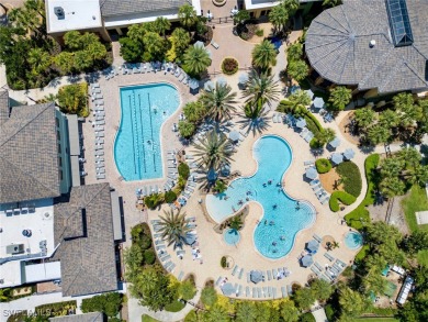 Nestled up to stunning waterfront and golf course views in the on Miromar Lakes Golf Club in Florida - for sale on GolfHomes.com, golf home, golf lot