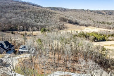 This spacious 2.2-acre lot offers a rare opportunity to build on Black Creek Club in Tennessee - for sale on GolfHomes.com, golf home, golf lot