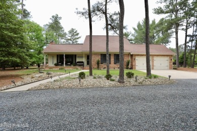 Immaculate golf front brick ranch home has been beautifully on Foxfire Golf and Country Club in North Carolina - for sale on GolfHomes.com, golf home, golf lot