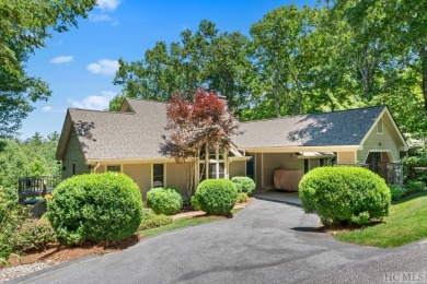 Partake in the mountain lifestyle with this 3 bedroom, 4.5 bath on Lake Toxaway Country Club in North Carolina - for sale on GolfHomes.com, golf home, golf lot