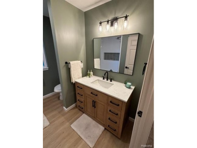 Come see this beautiful updated cozy home.  The moment you walk on Green Oaks Golf Course in Michigan - for sale on GolfHomes.com, golf home, golf lot