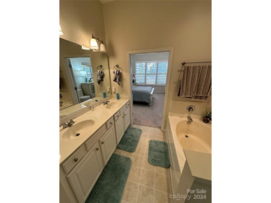 This immaculate townhome is freshly painted with dramatic high on Tega Cay Golf Club in South Carolina - for sale on GolfHomes.com, golf home, golf lot