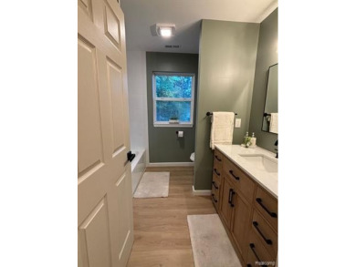 Come see this beautiful updated cozy home.  The moment you walk on Green Oaks Golf Course in Michigan - for sale on GolfHomes.com, golf home, golf lot